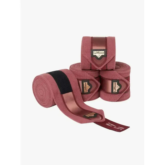 Pink plush lemieux loire polo exercise bandages with black elastic and lemieux label for secure wrapping