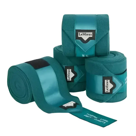 Teal lemieux loire polo bandages with black velcro closures and satin trim in polo bandages peacock style
