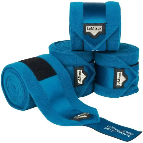 Bright blue lemieux loire satin polo bandages set of 4 with black velcro straps and branded labels marine color