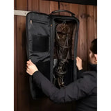 Black lemieux luxe bridle bag made of faux leather with multiple compartments and a sturdy handle for tack storage