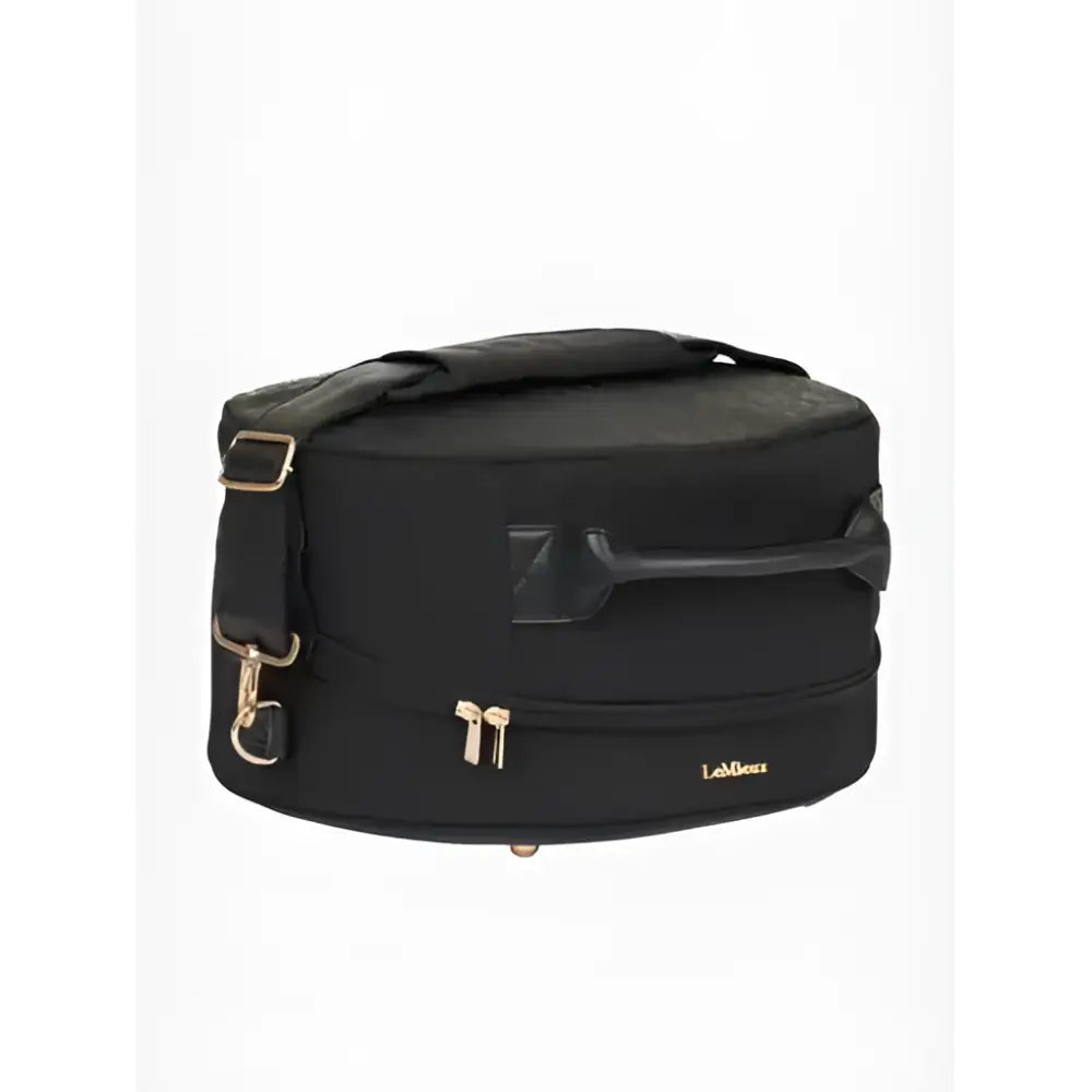 Black lemieux luxe hat box with textured surface and gold-tone zippers and hardware accents for stylish storage