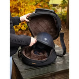 Black quilted lemieux luxe hat box with plush brown interior lining for secure equestrian hat storage