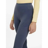 Navy blue lemieux lydia mesh leggings with high waist, subtle side pocket, and smooth stretchy fabric in dusk blue