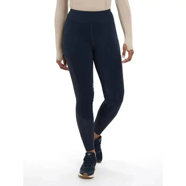 Navy blue high-waisted lydia mesh leggings by lemieux with subtle paneling and a sleek form-fitting design