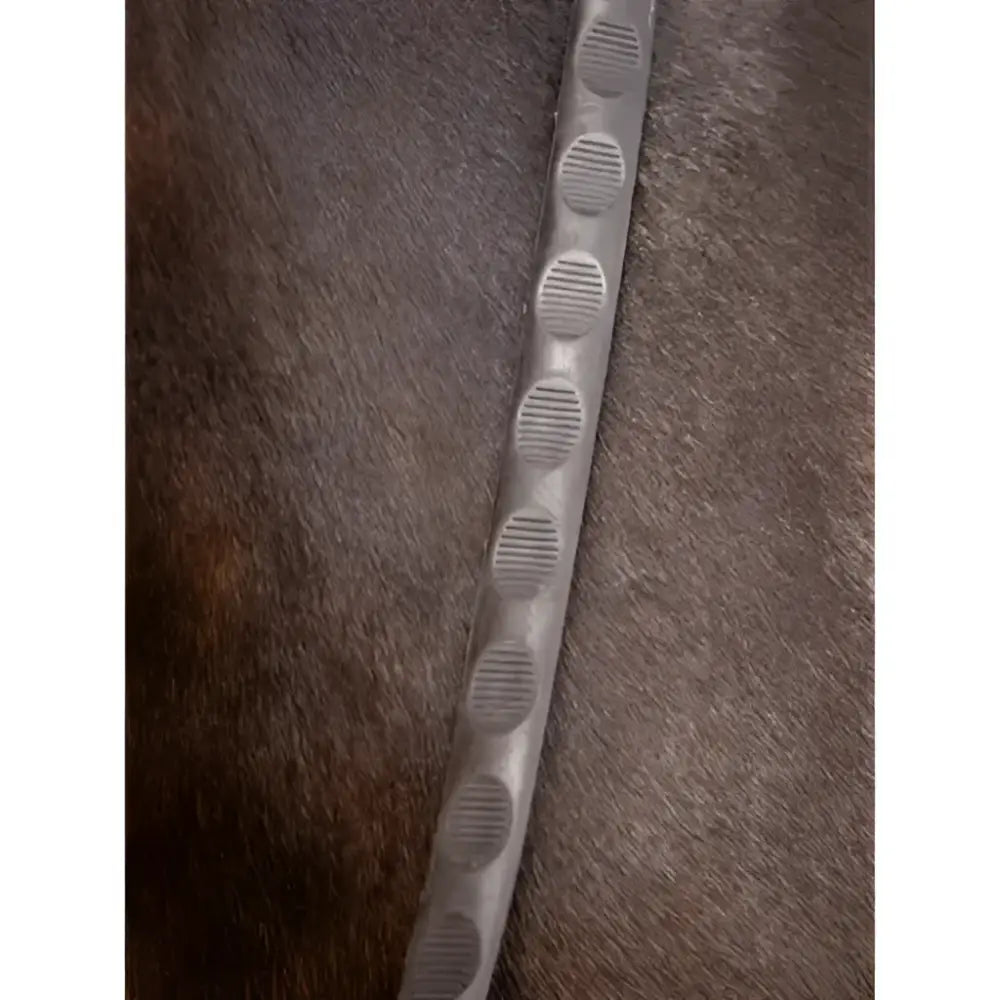 Gray rubber strap of lemieux magna grip rubber reins brown with oval indentations for extra grip and control