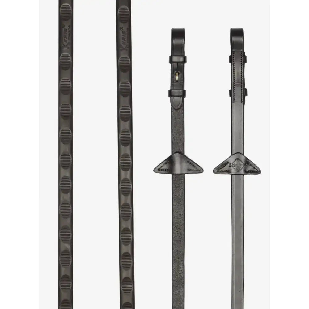 Black leather lemieux magna grip rubber reins brown with textured grip patterns and brass metal hardware for riding
