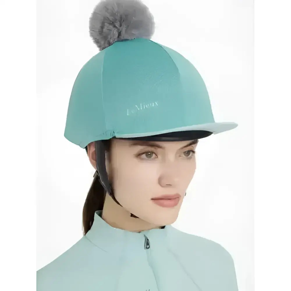 Teal lemieux maria mesh hat silk lagoon with gray faux fur pom-pom and white lemieux embroidery on top
