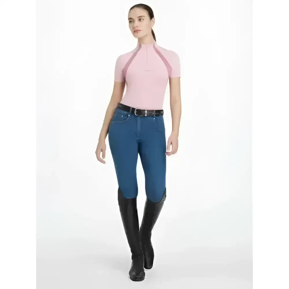 Pink short-sleeved lemieux maria mesh sleeve baselayer blossom with dark pink zipper accents for equestrian use