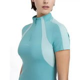 Teal and light blue lemieux maria mesh short sleeve baselayer lagoon with high collar and white side paneling