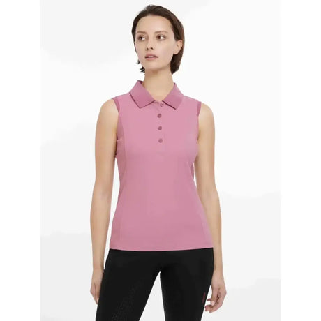 A soft pink lemieux marissa sleeveless polo peony with classic collar and matching buttons perfect for summer wear