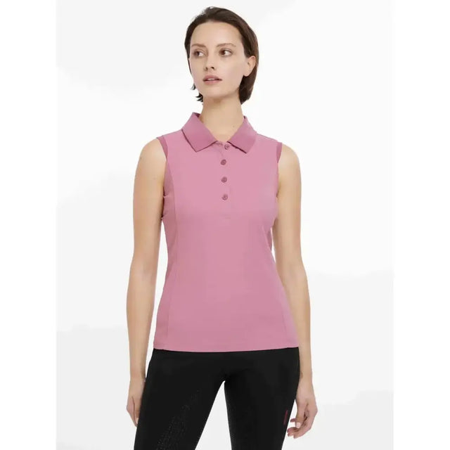 A soft pink lemieux marissa sleeveless polo peony with classic collar and matching buttons perfect for summer wear