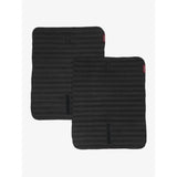 Black lemieux memory foam bandage pads with ribbed texture and red tags to keep your horses legs protected