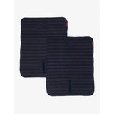 Black ribbed fabric car seat covers with small red brand tags paired with lemieux memory foam bandage pads navy protecting horse’s legs