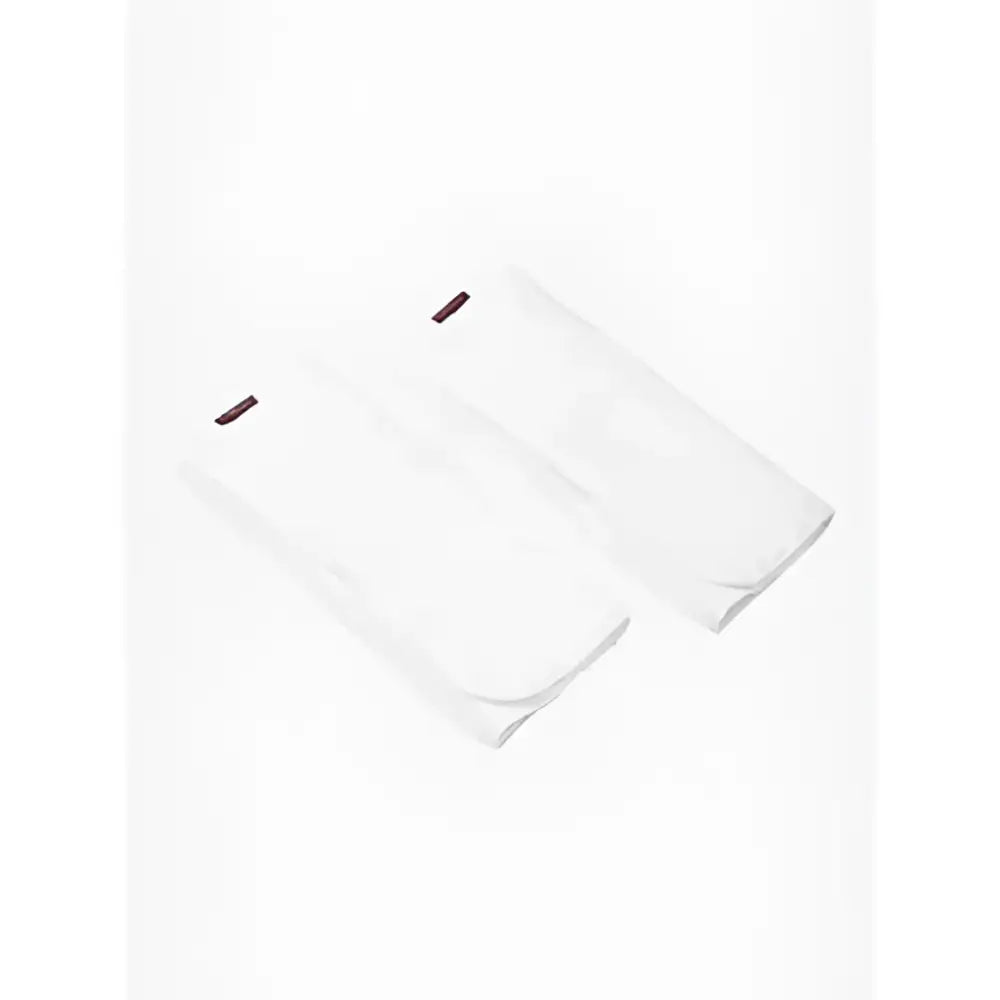 White cotton socks with black lemieux memory foam bandage tags for comfort and support foam bandage pads