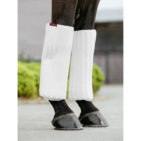 White ribbed lemieux memory foam bandage pads designed as horse leg wraps for comfortable support and protection