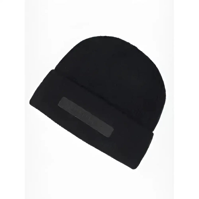 Black knitted lemieux mens beanie with ribbed cuff and subtle rectangular logo patch for everyday wear