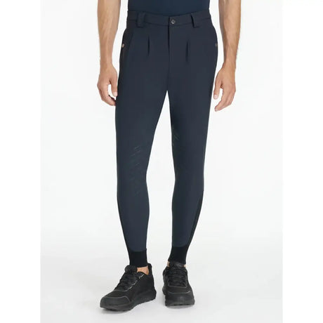 Dark navy lemieux mens classic riding pants with sleek form-fitting design and subtle pleats at the waist