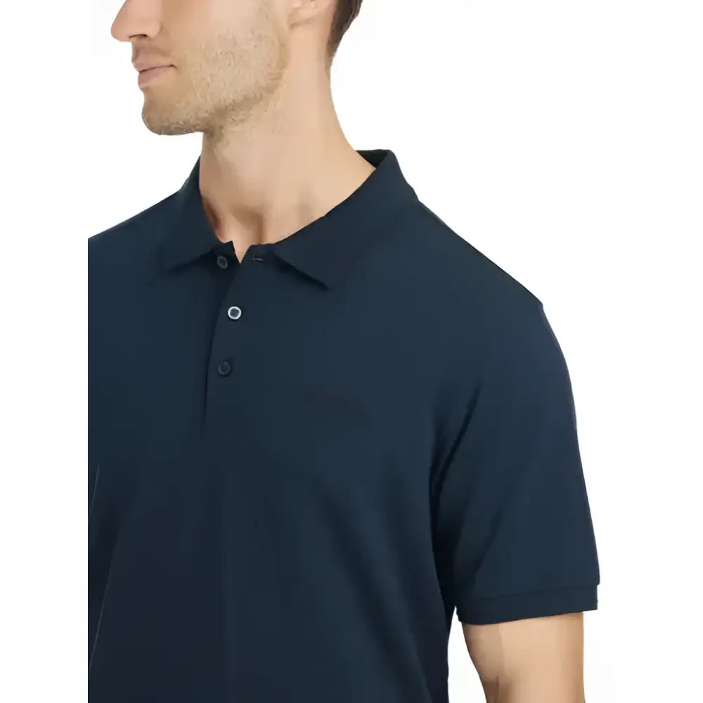 Dark navy blue lemieux mens classique polo shirt with subtle textured weave and small embroidered logo on left chest