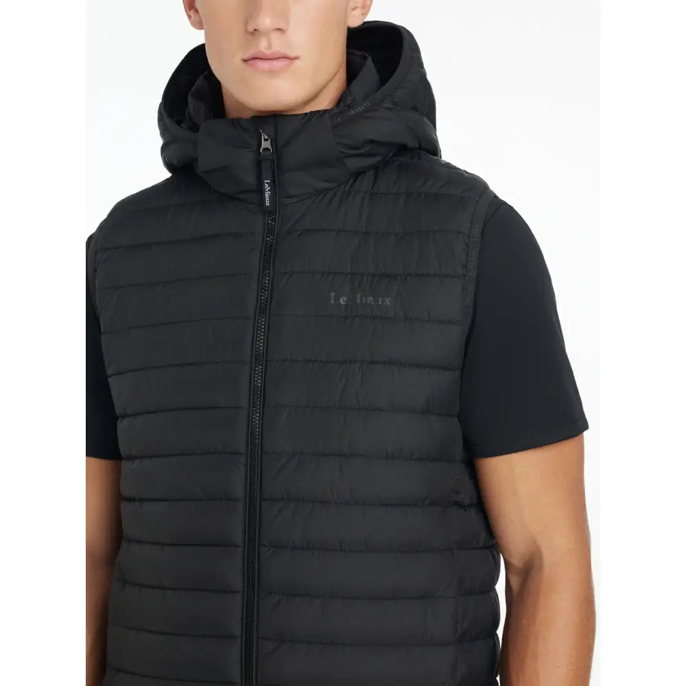 Lemieux mens hooded black puffer gilet with quilted ripstop fabric and front zipper featuring subtle chest logo