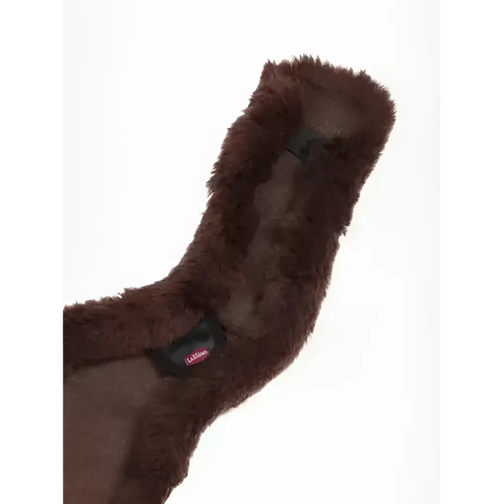 Brown plush soft fuzzy girth cover brown with a small black tag for anatomic jumping girth use by lemiuex