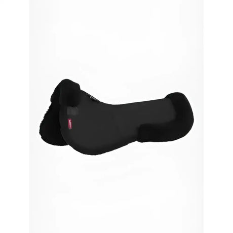 Black lemieux merino+ half pad showing plush soft sheepskin texture with sleek contoured design made from natural australian merino
