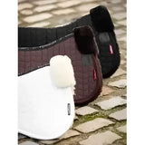 White and dark brown lemieux merino+ half pads with plush quilted surfaces made from natural australian merino
