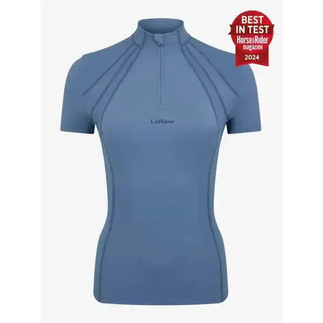 A sleek light blue lemieux mia mesh short sleeve base layer ice top with high collar and quarter zip closure