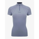 A sleek light gray lemieux mia mesh short sleeve base layer jay blue top with high collar and quarter-zip closure