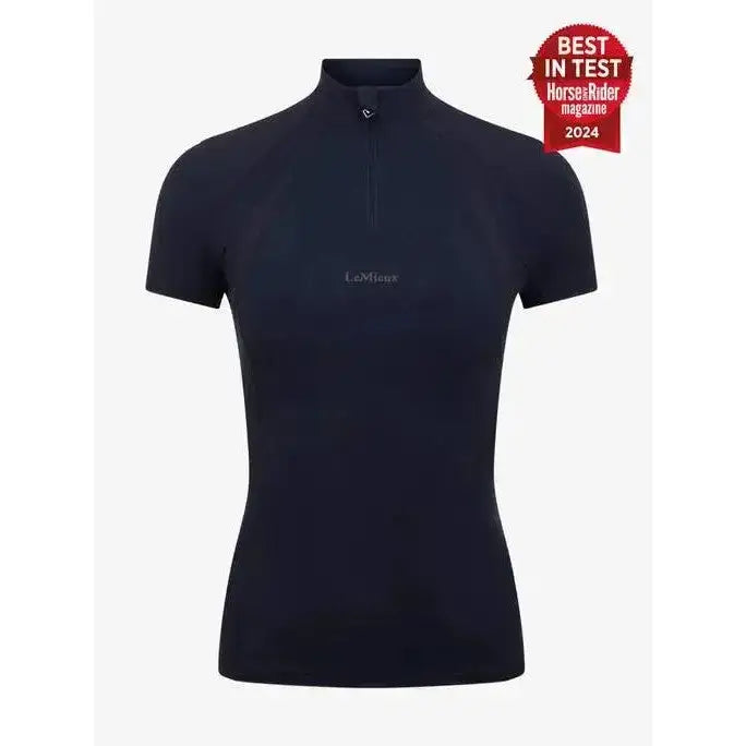 Navy blue lemieux mia mesh short sleeve base layer polo with half zip collar and subtle chest embroidery