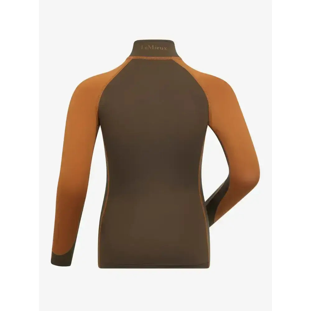 Women’s lemieux mini base long-sleeved rash guard in brown and orange with femboy logo perfect for base layer alpine
