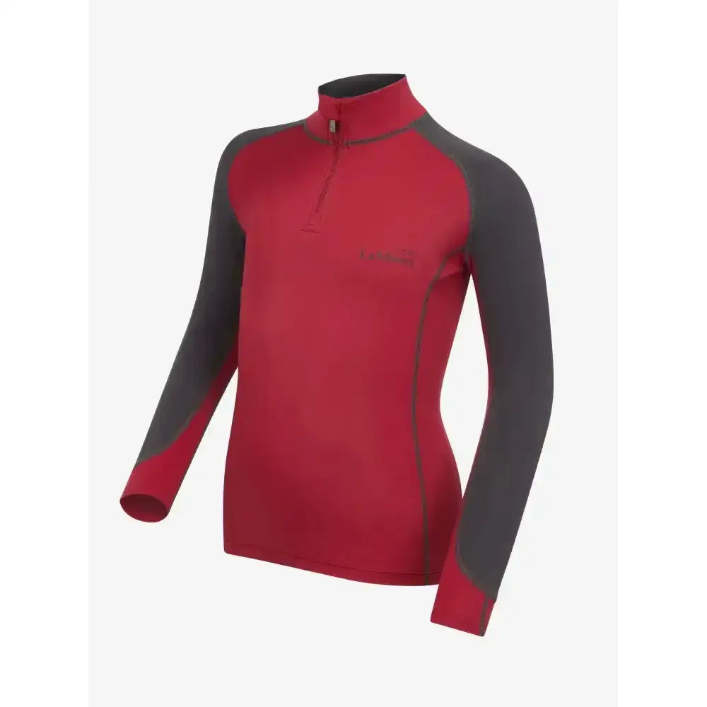 Red and gray long-sleeved lemieux mini base layer ember with quarter-zip collar for mini rider’s running and training