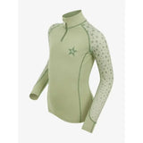 A light sage green lemieux mini base layer fern long-sleeved top with star pattern and quarter-zip collar for mini rider’s running