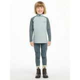 A child wearing a lemieux mini base layer glacier in light blue and dark gray with a quarter-zip collar and matching pants