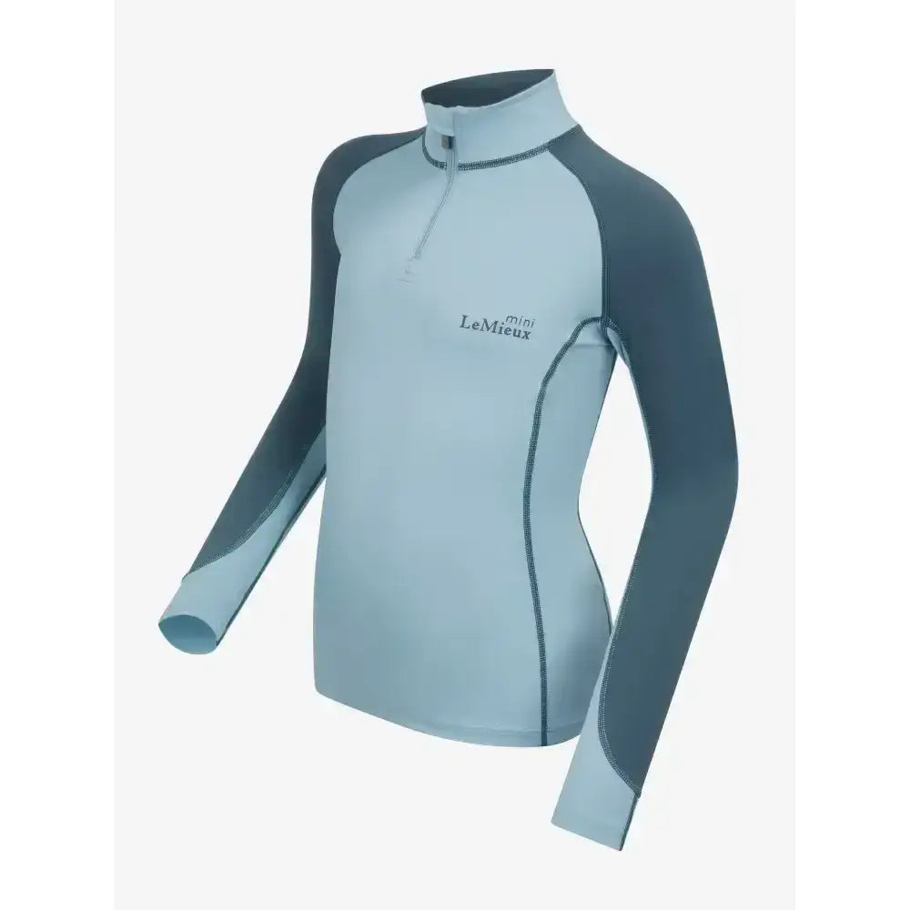 Light blue and dark gray long-sleeved lemieux mini base layer glacier with quarter-zip and embroidered logo