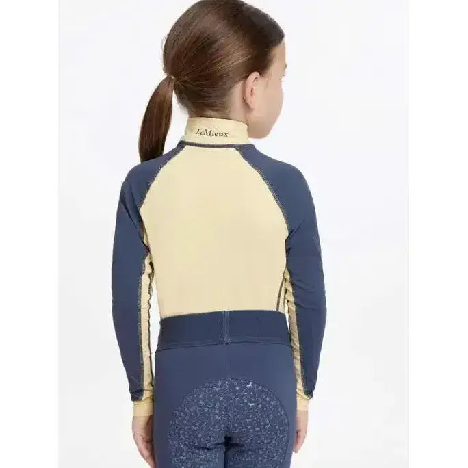 Navy and beige lemieux mini base layer mimosa long-sleeved top with subtle gold trim for equestrian use