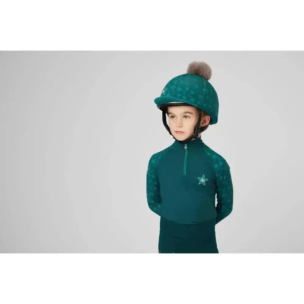 Teal lemieux mini base equestrian helmet with fuzzy pom pom and matching riding jacket with star emblem base layer spruce