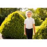 White lemieux mini bella short-sleeved equestrian shirt with subtle gray pattern and high collar perfect competition wear