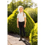 White short-sleeved lemieux mini bella polo shirt with subtle pattern perfect competition wear mini bella short style