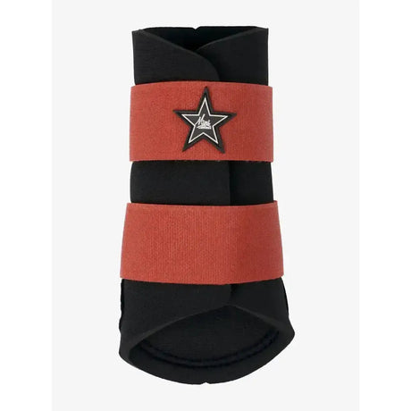 Black and rust lemieux mini grafter hoof protector boot with star logo in sienna color for horse brushing