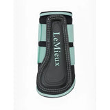 Lemieux mini brushing boots aqua in black and mint green with stitched detailing for horse hoof protection