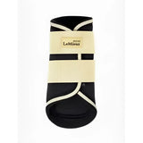 Black and cream lemieux mini brushing boots mimosa with elastic straps for hoof protection and brushing