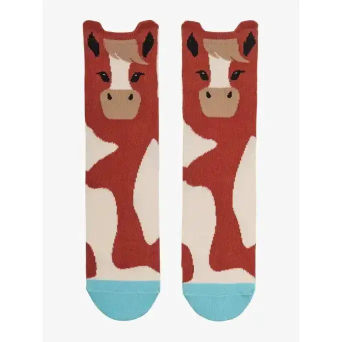 A pair of lemieux mini character red and white cow-themed socks with black ears tan face and light blue toe caps