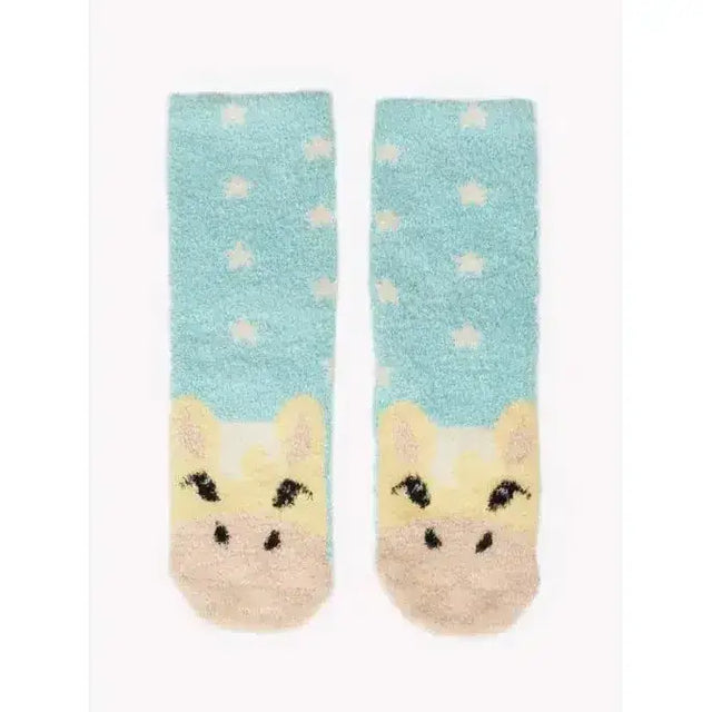 A pair of cozy lemieux mini character socks pack lemon with fuzzy blue star top and yellow giraffe face design