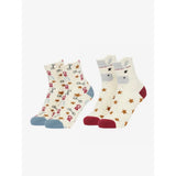 A pair of lemieux mini character ankle socks in cream with blue and red accents featuring playful equestrian patterns