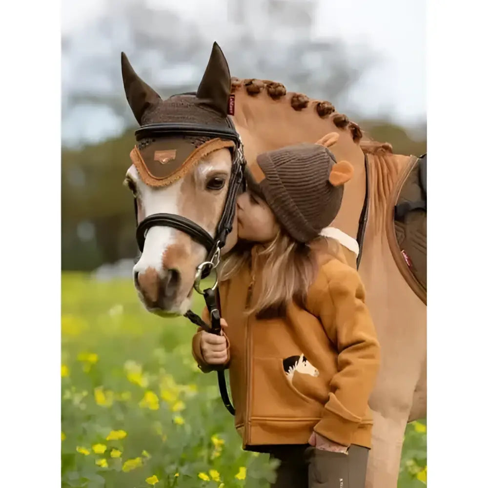 Brown horse wearing lemieux mini charlie super snuggly lined hoodie ginger with black and tan bridle and decorative stitching