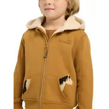 A mustard-yellow lemieux mini charlie hoodie ginger with super snuggly beige-lined hood and horse patch pockets