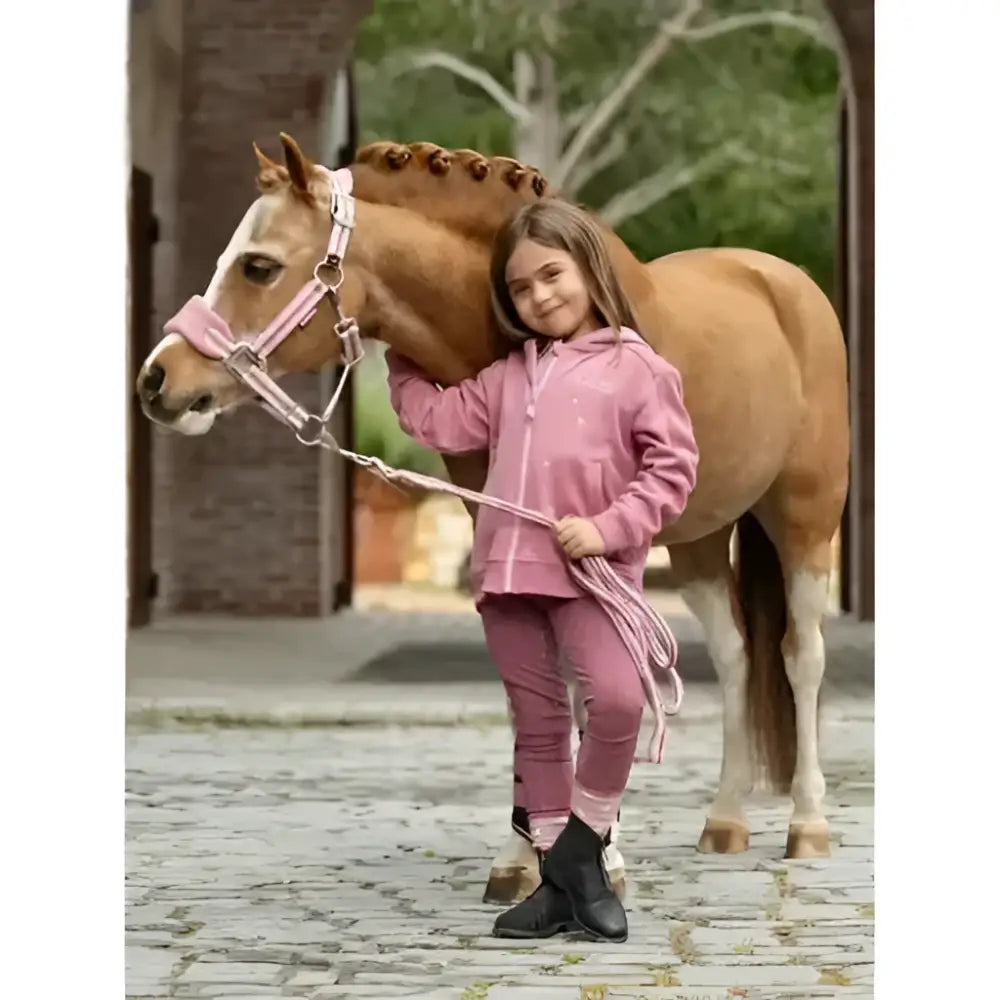Pink lemieux mini charlie zip horse halter with braided straps and decorative metal fittings in peony color