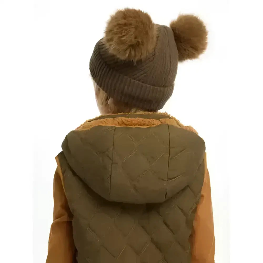 Brown knitted lemieux mini clara beanie with two fluffy pom-poms perfect for alpine winter fun