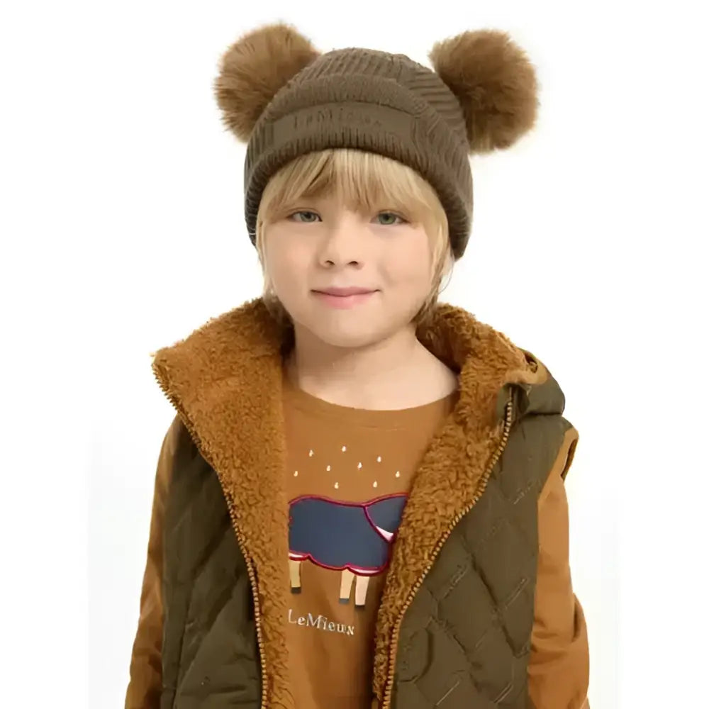Brown knitted lemieux mini clara beanie with fluffy pom-poms perfect for winter warmth and style clara beanie alpine