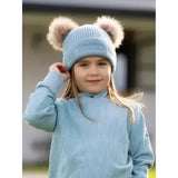 Light blue knitted lemieux mini clara beanie glacier with fluffy brown pom-poms on top for cozy winter wear